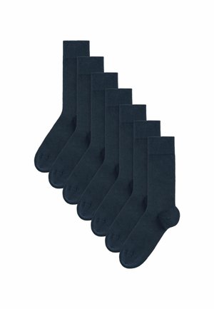 Dunkelblaue Baumwollsocken, Set aus acht, mittellange Socken mit gerippten Bündchen und verstärkten Spitzen. Glatte Textur, keine sichtbaren Muster.