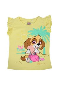 Chemise jaune à manches courtes avec des manches volantes, présentant un chien de dessin animé tenant une pelle rose sur fond de plage avec des palmiers.