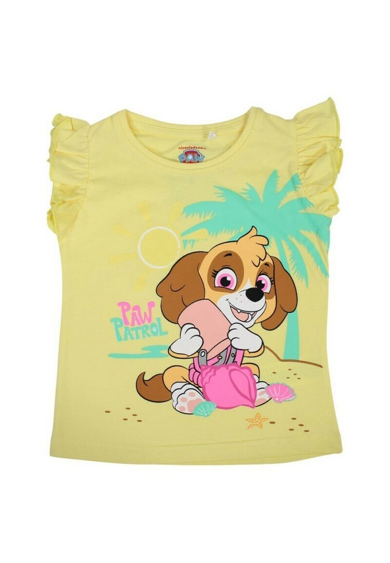 Chemise jaune à manches courtes avec des manches volantes, présentant un chien de dessin animé tenant une pelle rose sur fond de plage avec des palmiers.