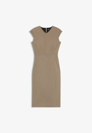 Vestito beige aderente con maniche a cappuccio, scollatura a V e due tasche laterali. Tessuto testurizzato con cuciture in vista e chiusura con cerniera sul retro.