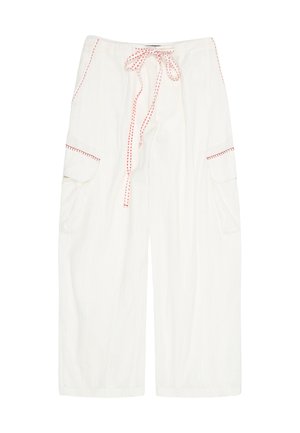 White wide-leg pants with side cargo pockets, red stitching details, and a matching drawstring waist tie.