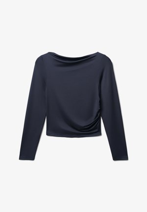 Top lungo blu navy con scollo a barco e dettaglio arricciato ai lati, realizzato in un tessuto morbido e elastico. Lunghezza cropped.