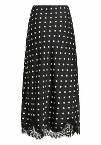 Jupe noire à pois blancs, fabriquée en tissu lisse. Elle possède une bordure en dentelle noire à l'ourlet pour plus de détails.