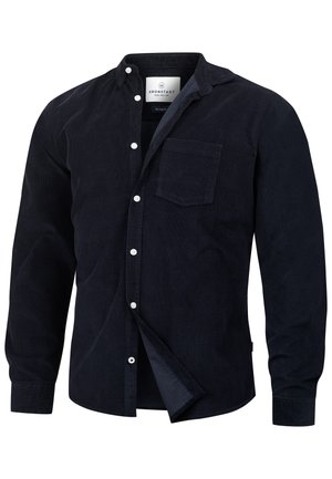 Dark navy corduroy button-up shirt with a chest pocket, white buttons, and a soft texture. Features a classic collar and long sleeves.