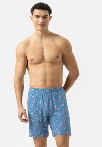 Blauwe gestreepte shorts met een speelse uitstraling en multicolore motieven. Gemaakt van zachte stof en voorzien van een elastische tailleband voor comfort.