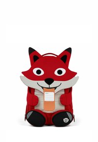 Red and white fox-shaped children's backpack with large eyes, black nose, paws, and name tag on front pocket.