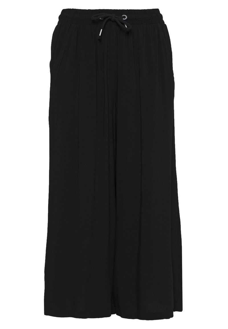 Pantalons noirs à jambe large en tissu léger, avec une taille élastique et un cordon de serrage, arborant une coupe ample et des plis verticaux.