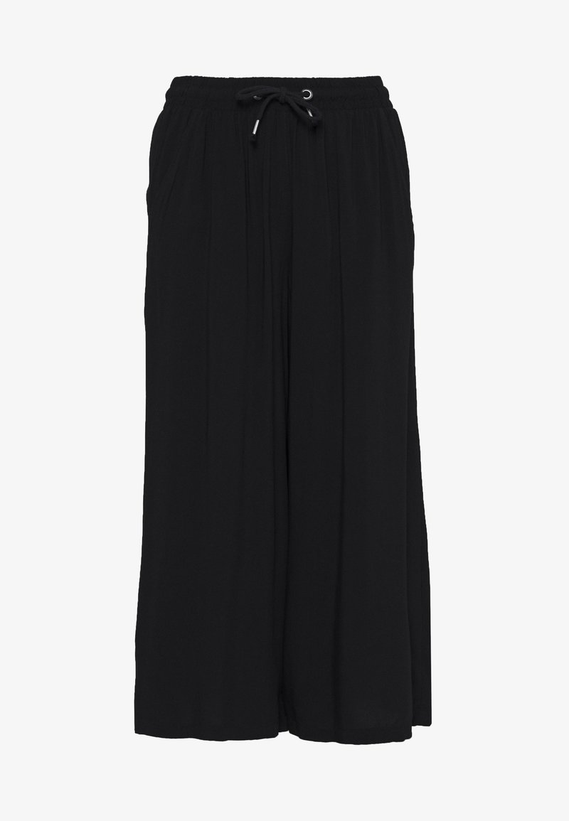 Pantalons noirs à jambe large en tissu léger, avec une taille élastique et un cordon de serrage, arborant une coupe ample et des plis verticaux.
