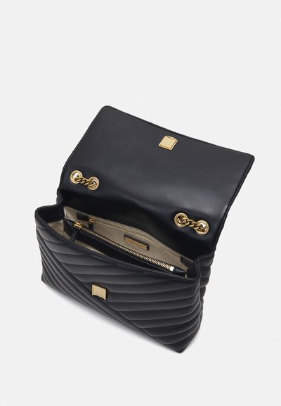 Tory Burch KIRA CHEVRON CONVERTIBLE SHOULDER - Cross body bag - black