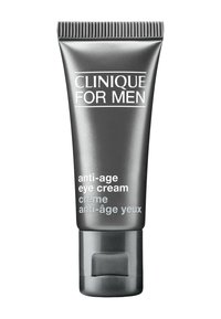 Tube gris avec un capuchon strié, étiqueté "Clinique for Men", contenant une crème pour les yeux anti-âge ; design élégant et minimal avec texte blanc.