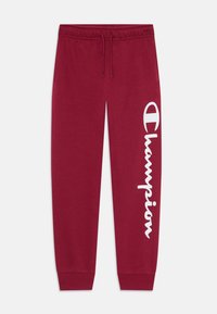 Pantalones de chándal burdeos de mezcla de algodón, con cintura ajustable con cordón, piernas entalladas y un gran logo blanco de "Champion" en el costado.