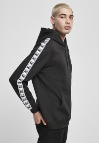 Starter REGULAR FIT - Jersey con capucha - black