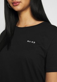NA-KD Triko s potiskem - black