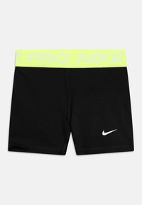 Czarne sportowe szorty z neonowożółtym paskiem w talii, na którym znajduje się napis "PRO" i "NIKE". Zawierają małe białe logo Nike w lewym dolnym rogu.