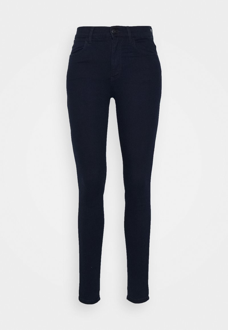 Tummansinisiä skinny-farkkuja, joissa on korkea vyötärö, viisi taskua ja vetoketjukiinnitys napilla. Pehmeä rakenne.