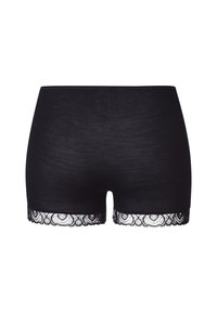 Svarta bomullsshorts med en ribbad textur och intrikat spetsdekoration i fållen som ger en dekorativ accent.
