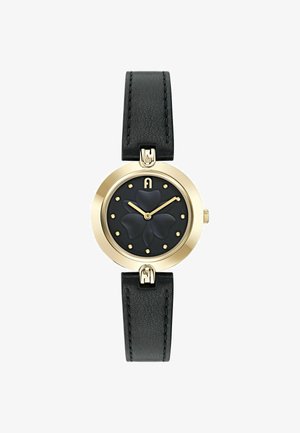 Watch with a black leather strap and a round gold-tone case. Black dial features a flower design and gold dot hour markers.