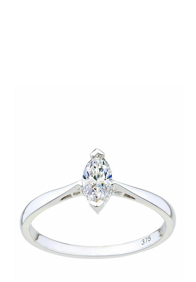 Anillo de oro blanco con una piedra central de diamante en corte marquise, banda pulida y sutiles detalles de acento en el engaste. Presente sello grabado.