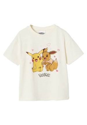 Cream-colored t-shirt featuring Pikachu and Eevee sitting together, surrounded by pink hearts, with "Pokémon" text below.