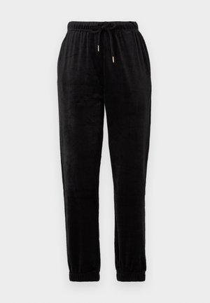 Pantaloni da jogging neri realizzati in tessuto morbido; vita elastica con cordoncino regolabile, polsini alle caviglie, con dettagli in metallo dorato.