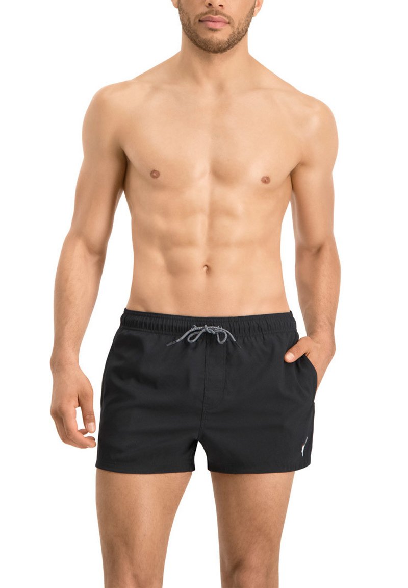 Schwarze Badehose mit elastischem Bund und grauem Kordelzug. Hergestellt aus leichtem Material, mit einem kleinen Logoschild an der Seite.