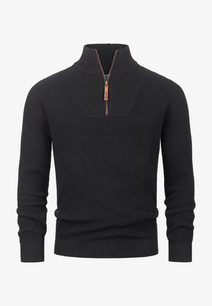 Black knit sweater featuring a half-zip collar and textured ribbed detailing. The cuffs and hem are also ribbed for a fitted look.