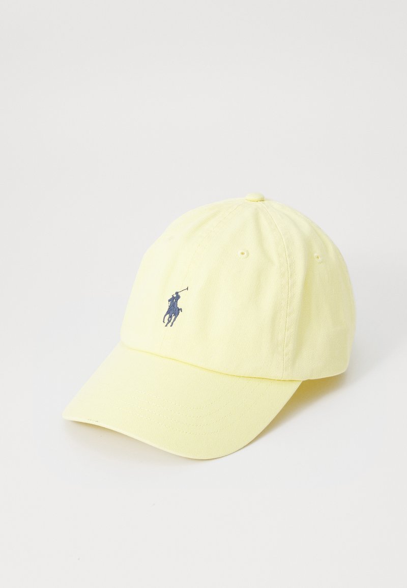 Boné de beisebol amarelo em algodão com logótipo bordado azul escuro na frente. Apresenta uma coroa estruturada, aba curva e forro ajustável.