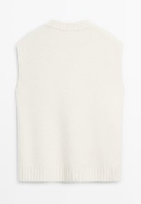 Strikket ærmeløs sweater i off-white med rund halsudskæring, ribbet kant og blød tekstur. Fås i en afslappet pasform.