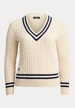 Kreemikas kaabelkudumiga V-kaelusega kampsun tumesiniste triipudega kaelusel, mansettidel ja serval, väike tikitud logo vöökoha lähedal.