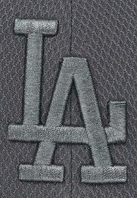 Gray cap with textured fabric features large gray embroidered "LA" logo. The logo has a three-dimensional appearance and bold design.
