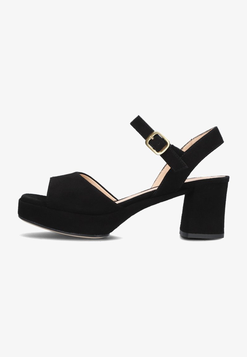 Black suede platform sandals with an open toe, ankle strap, and gold buckle, featuring a chunky heel and smooth texture.