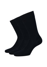 Trzy pary czarnych bawełnianych skarpetek o gładkiej fakturze, z prążkowanym ściągaczem i klasycznym długością sięgającą do kostki.