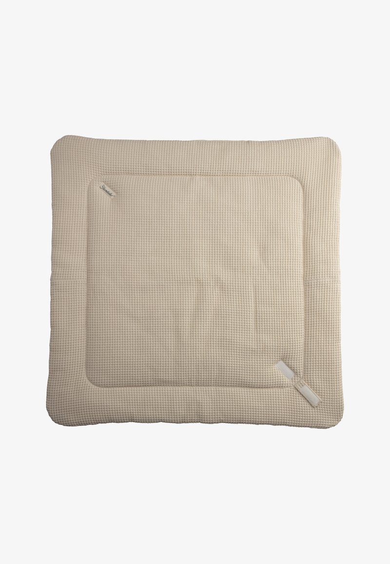 Beige quilted cushion with a textured surface, square shape, and stitched border. Includes a small label in the corner.