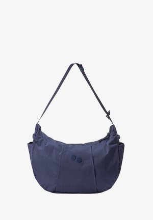 Marineblaue Schultertasche mit verstellbarem Riemen, gerundetem Boden, zwei Knopfverzierungen vorne und Seitentaschen, isoliert auf weißem Hintergrund.