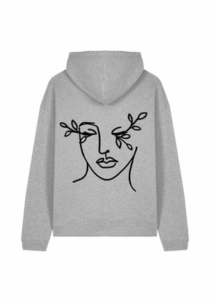 Felpa grigia con cappuccio caratterizzata da un disegno a linea nera di un volto con foglie vicino agli occhi. Realizzata in tessuto morbido, con vestibilità comoda e cappuccio con cordino.