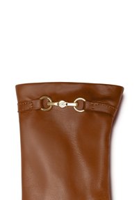 Brown leather glove with a smooth texture, featuring a gold-colored hardware accent and stitching detail at the wrist.