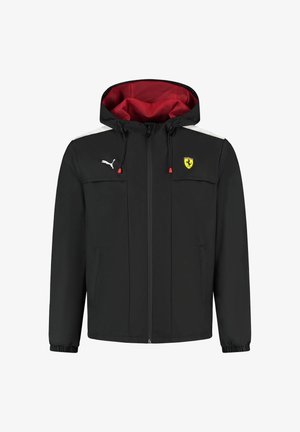 Czarna kurtka z kapturem, z czerwoną podszewką, białymi akcentami na ramionach oraz logo Ferrari. Posiada zamek błyskawiczny i elastyczne mankiety. Wykonana z lekkiego materiału.