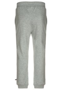 Grå sweatpants med elastisk midjeband, sidofickor och ribbade muddar. Materialet är mjukt och något strukturerat.