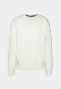 Ljusgrå crewneck sweatshirt med långa ärmar, ribbade muddar och en diskret logotyp på övre vänstra bröstet.