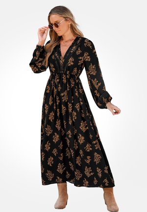 Zwarte maxi-jurk met een bloemmotief in oranje. Beschikt over lange mouwen, een V-halslijn en een geraffineerde taille. Zachte stof met een vloeiende silhoeet.