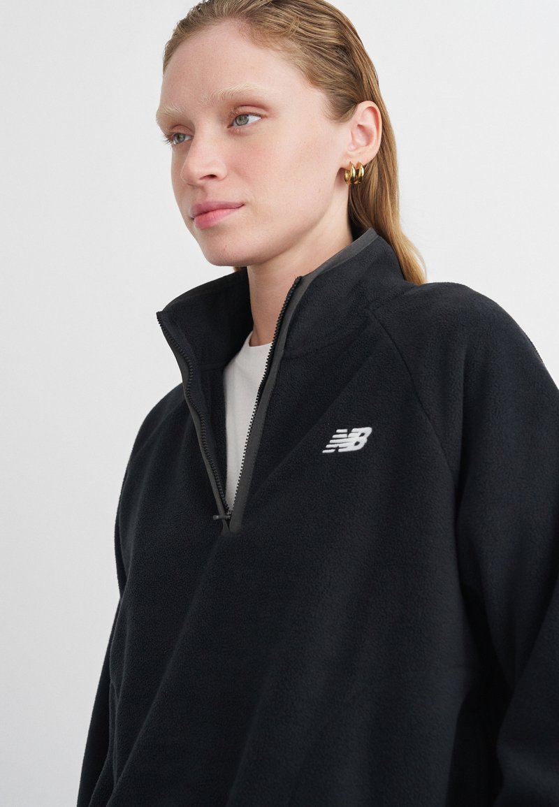 New Balance HALF ZIP - Flīsa džemperis - black