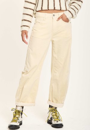 WIDE - Trousers - beige
