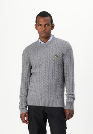 Light grey cable-knit sweater with a round neckline and ribbed cuffs, featuring a small yellow logo on the left chest.