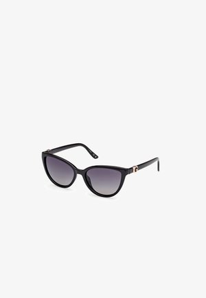 Schwarze Cat-Eye-Sonnenbrille mit Verlaufsgläsern, glatten Kunststoffrahmen und goldfarbigen Hardwareakzenten an den Schläfen.