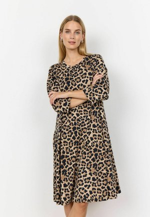 Leopard-print dress in tan and black, featuring a round neckline and three-quarter sleeves. Soft fabric with a relaxed, flowing silhouette.