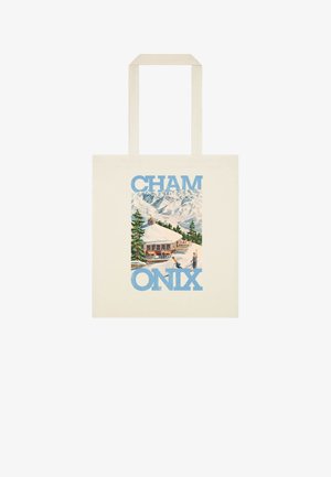 Bomuldstaske med vintage-tryk af sneklædte bjerge, fyrretræer, chalet og skiløbere, med teksten "CHAM ONIX" i blå bogstaver.