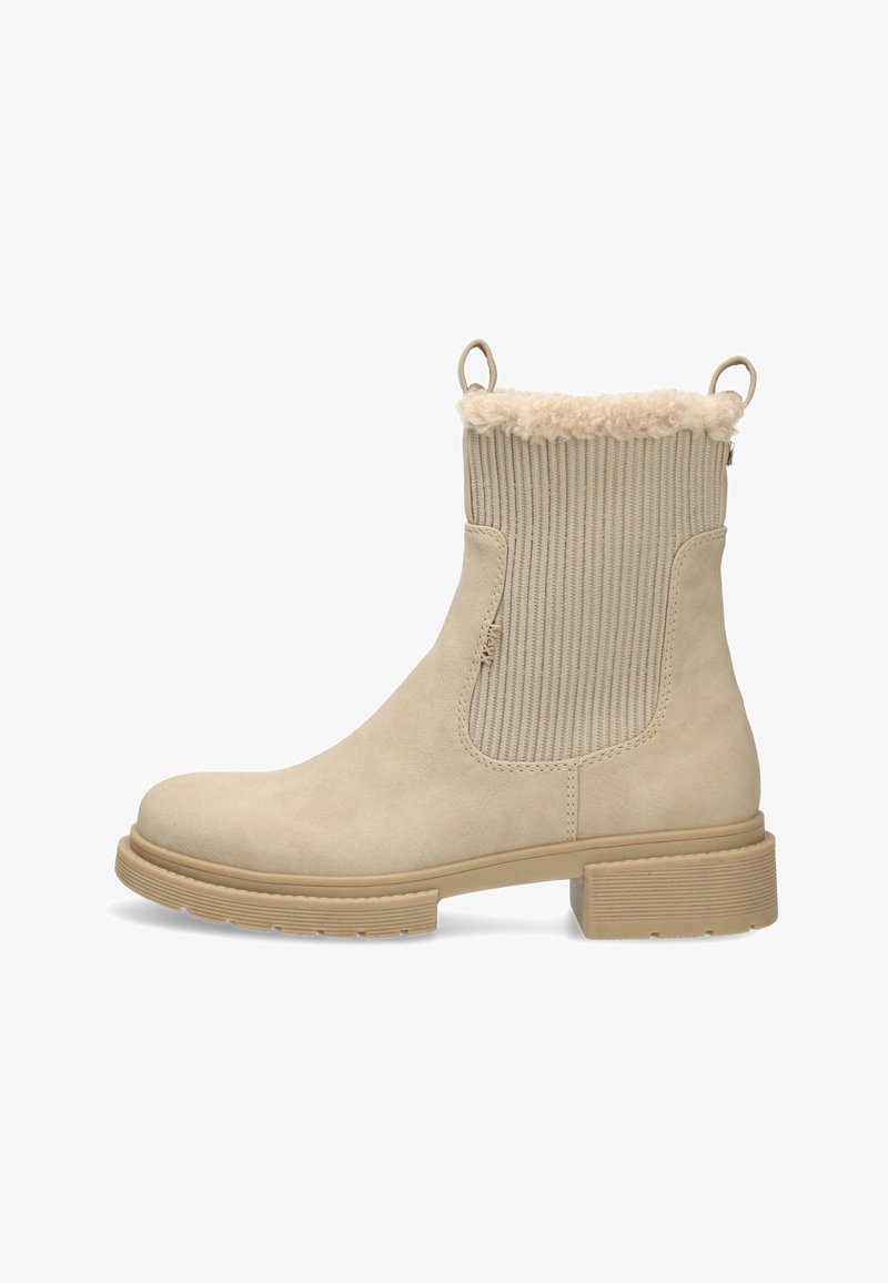 Beige ankelsko med mockalook, ribbat tyg upptill, fuskpälsdetalj, sidodragkedja och texturerad gummisula.