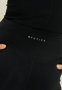 Next SUPERSOFT EVERYDAY - Tamprės – kelnės - black