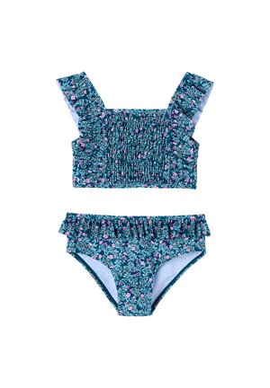 Blue two-piece swimsuit with pink floral pattern, smocked top with ruffled straps, and ruffled waist on bikini bottoms.
