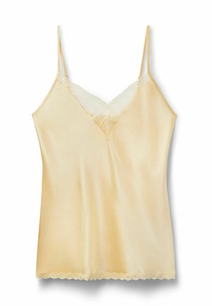 Camisole en satin crème avec fines bretelles ajustables, bordure en dentelle le long du décolleté en V et de l'ourlet.